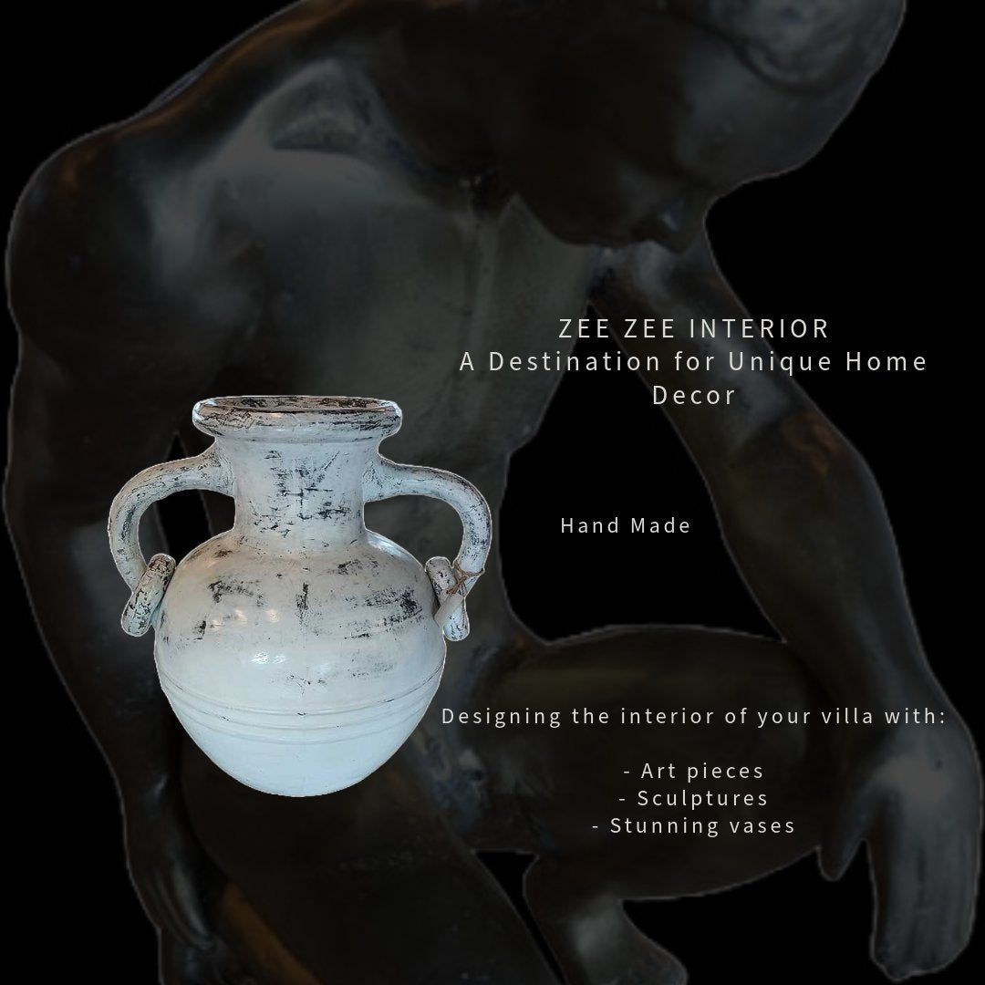 Designing the interior of your villa with: - Art pieces - Sculptures - Stunning vases