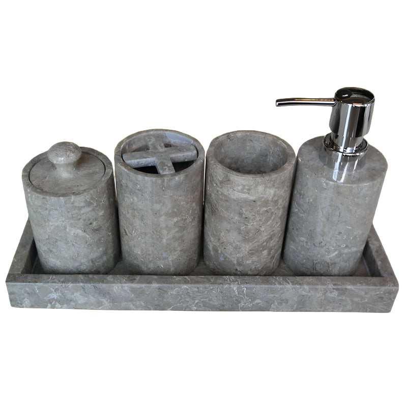 Hospitality Bathroom accessory set with stone-textured bottles and a soap dispenser on a tray.
