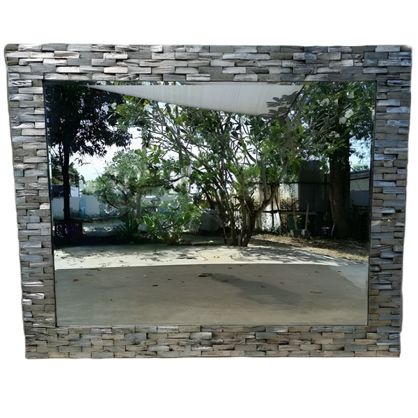 Edged Mirror Frame, made from recycled wood and finished with prada.