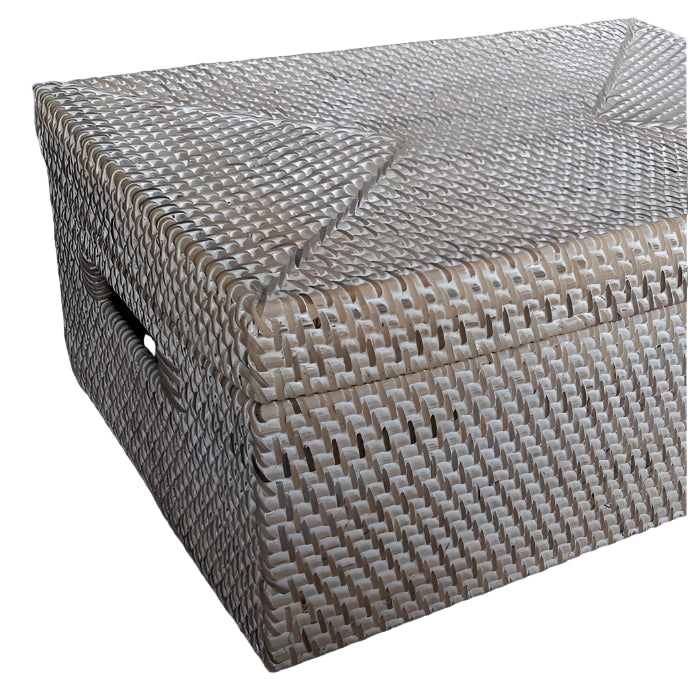 Woven storage box on a tiled floor