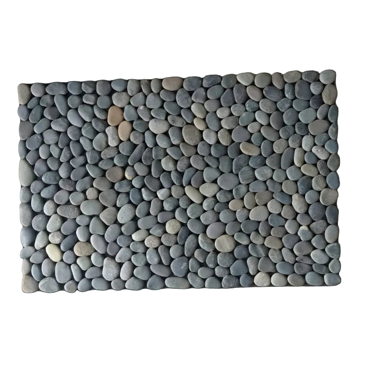 Rectangular mat made of interlocking stone-like pieces on a white background