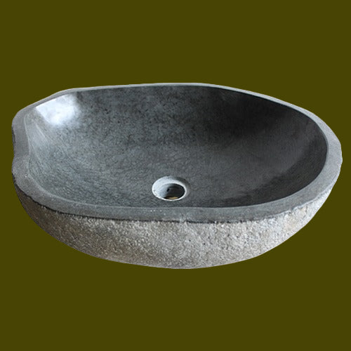Gray stone wash basin sink on a beige background