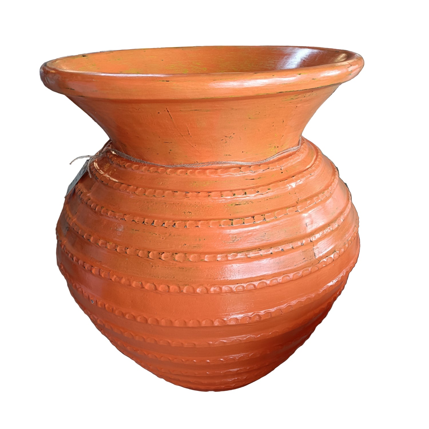 Terracotta pot with ribbed design on a white background