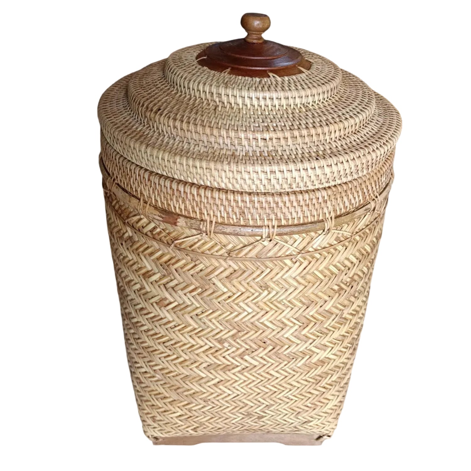 Woven basket with a wooden lid.