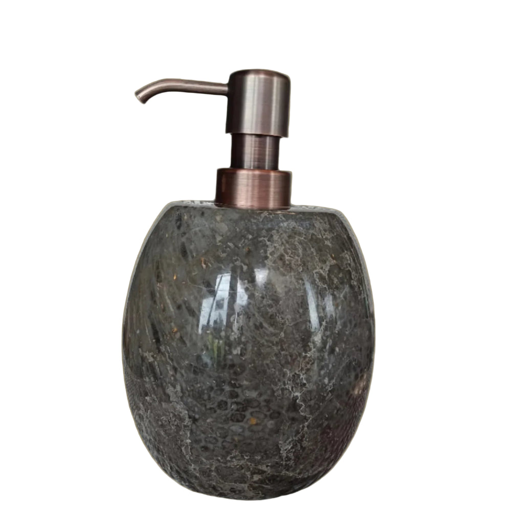 Soap dispenser with bronze pump and stone-like body.