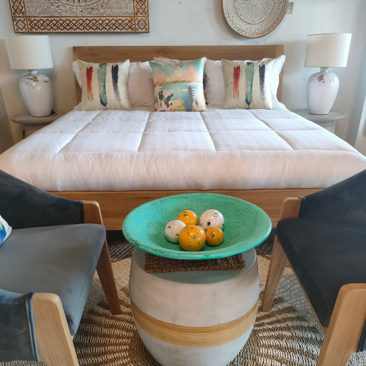 Bedroom room with a round table, chairs, vlla decor.