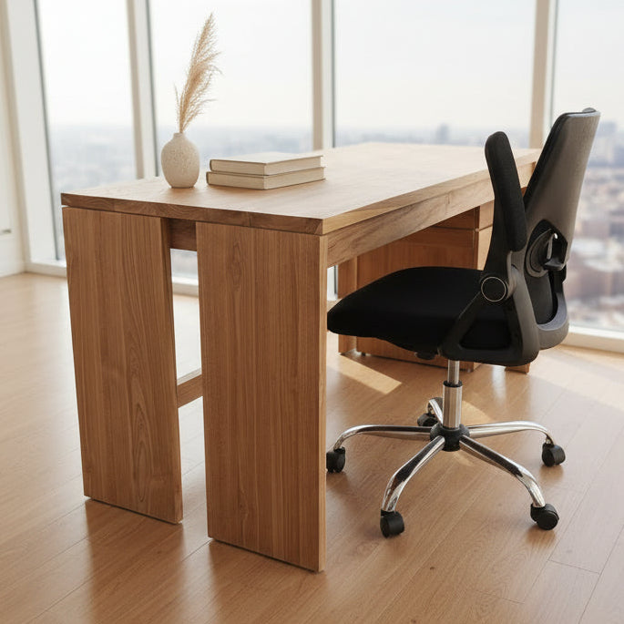 Modern office setup with wooden desk, chair, and plants in a bright room.