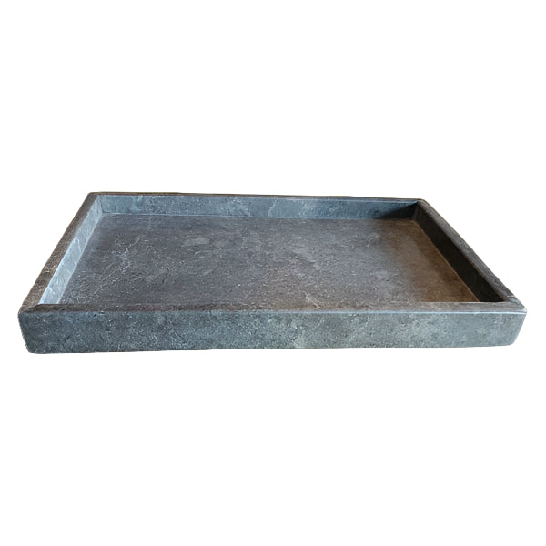 Rectangular stone tray on a solid background