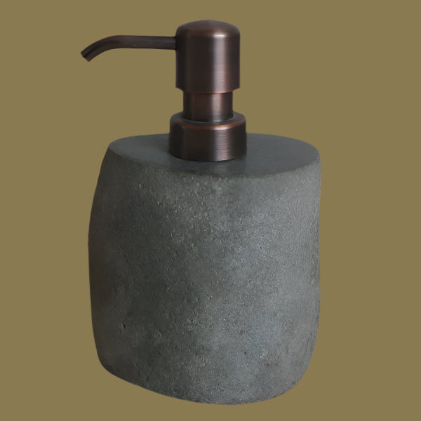 Stone Soap dispenser with bronze pump.
